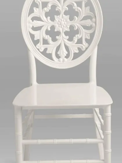 For a more elegant and decorative look, we offer banquet chairs like this white one with an ornate backrest. It's a popular choice for weddings and upscale events.