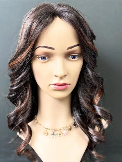 This molten honey colored wig is one of our most glamorous custom pieces. It's perfect for everyday wear and is made with high-quality Remy hair.
