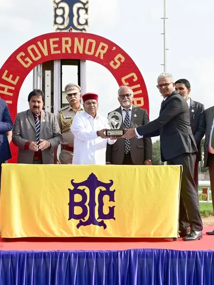 We are honored to host esteemed dignitaries at our events. Here, the Hon'ble Governor of Karnataka, Shri. Thaawar Chand Gehlot, presents The Governor's Cup, highlighting the high-profile networking opportunities and prestige associated with sponsoring a race at our club.