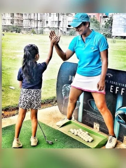 There's nothing better than seeing a young golfer fall in love with the game. A high-five after a great shot at the driving range captures the fun and encouraging atmosphere I create for my junior students.