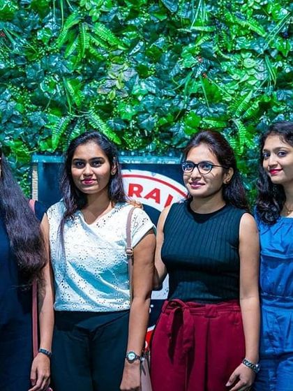 Guests posing against the green wall at Antigravity. Every corner of the club was filled with people having a good time.