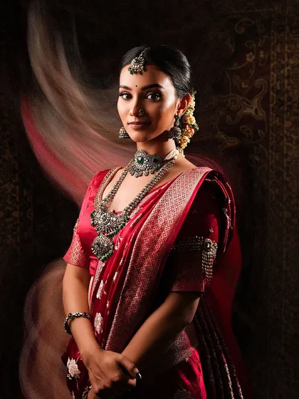 For those who love a more understated and artistic style, I recommend my oxidized silver jewellery. This set, with its intricate patterns and muted finish, pairs wonderfully with silk and handloom sarees for an effortlessly elegant look.