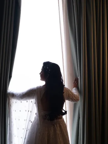 Before the world sees the bride, she meets the light. I love capturing these quiet, powerful silhouettes that tell a story of anticipation and dreams.