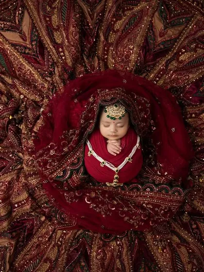 I was so honored to create this portrait using the mother's own wedding lehenga. Incorporating such a meaningful family heirloom results in a truly unique and deeply personal image that connects generations.