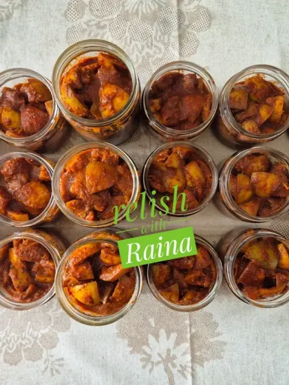 Here are the jars from a fresh batch of my sour and spicy lemon pickle. You can see the simple, clean preparation with just lemon pieces and spices. It's a pure, unadulterated taste that gets better with time.