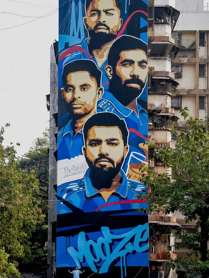 Go big or go home. I had the incredible opportunity to paint this massive 80-foot mural for the Mumbai Indians, featuring cricket legends like Rohit Sharma. This project, visible from the Sion highway, shows how we can turn entire buildings into landmarks.