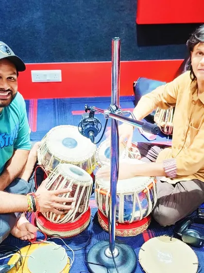 Here I am with my guru, Suresh Verma uncle ji, during a recording session. Learning from the masters is a lifelong journey, and I bring that depth of knowledge to every project I work on.