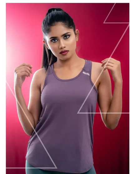 A studio shoot for an activewear brand, using a bold red background to create a high-energy feel. This image shows my ability to produce clean, powerful commercial photography for fitness and lifestyle brands.