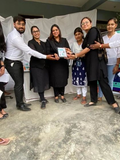 My team and I receiving a token of appreciation from the foundation. It was a day of meaningful work and heartfelt connections.