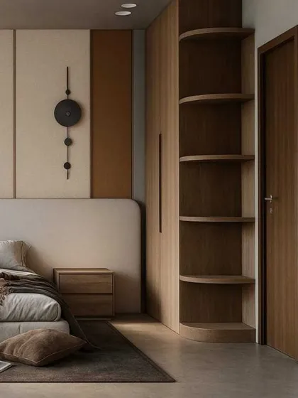On the other side of the bed, a curved, open shelving unit is built into the wardrobe, providing a beautiful display space while softening the corner of the room.