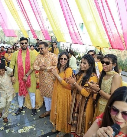 Leading the guests in a dance train at a Haldi ceremony. It's one of my favourite ways to get everyone moving together.