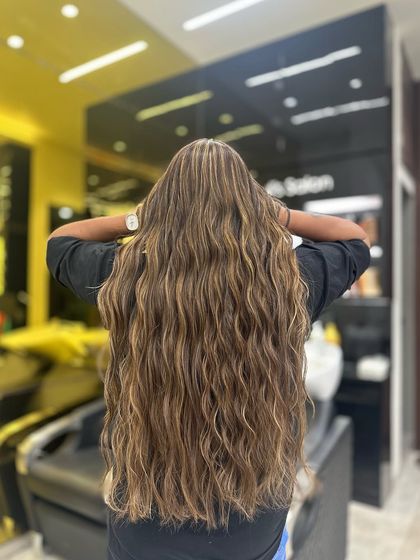 Long hair, don't care, when it's kissed by ash brown flair. This is effortless beauty, from roots to ends.