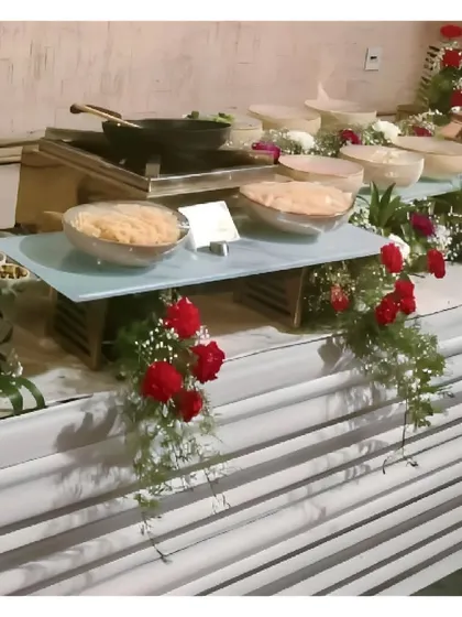 A live pasta or noodle station being set up for an event. Guests can enjoy watching our chefs prepare their customized dish with fresh ingredients.
