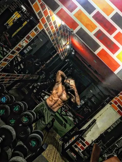 Trust yourself that you can do it. A creative angle showing my shredded physique.