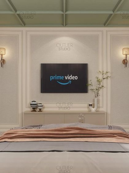 A view of the media wall in the green and beige bedroom. The design features simple wall paneling and a minimalist console, keeping the focus on the serene and calming color palette.