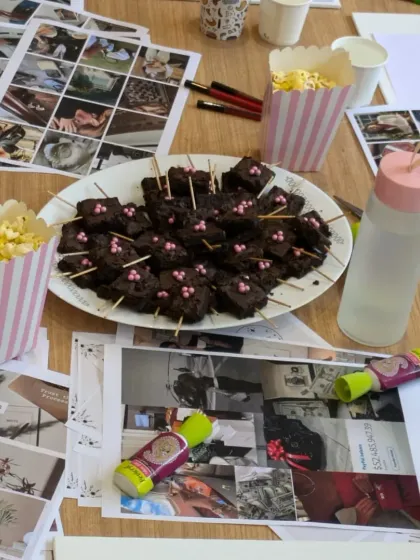 Of course, no workshop is complete without snacks. Brownies, popcorn, and art supplies fuel our sessions of dreaming and planning.