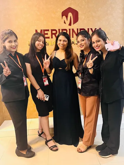 A candid moment with some of our bright students on Certificate Day. The victory signs say it all. They are ready for success.