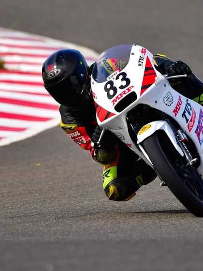 Siddesh leaning deep into a corner during his race in the TVS RR 310 One-Make Championship, part of the INMRC weekend.