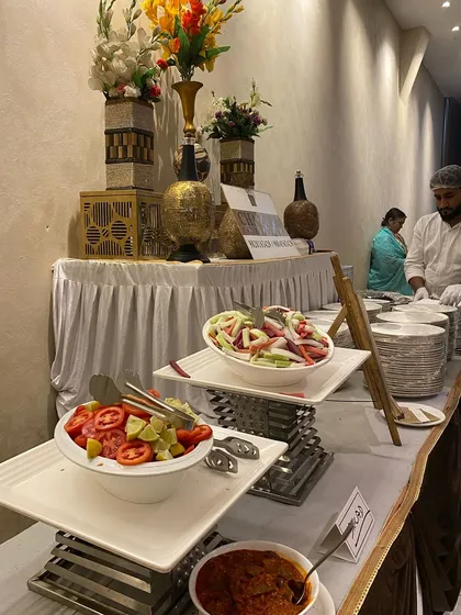 The salad and pickle counter at a "Mata ki Chowki" event, part of our full-service Jain catering.