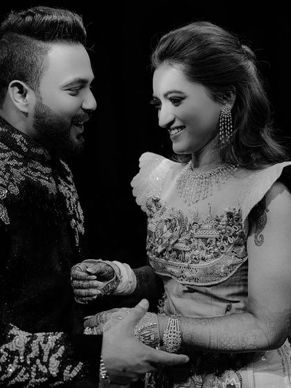 A classic black and white portrait of Aditya and Megha. This timeless image focuses on their expressions and connection, creating a feeling of old-world romance and elegance.