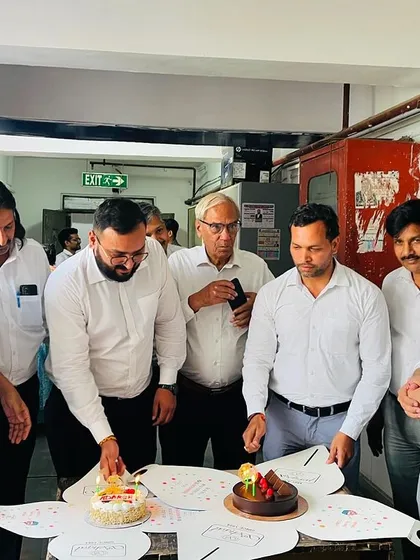 Another view of our team's birthday celebration, showing the camaraderie among colleagues.