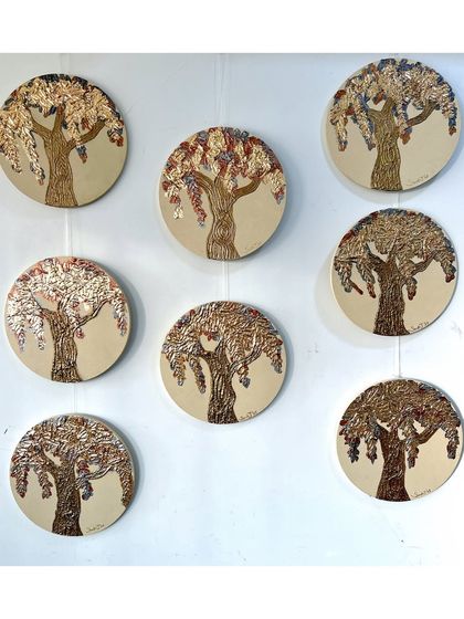 Another arrangement of the Diwali tree artworks. These pieces are perfect for gifting during the festive season.