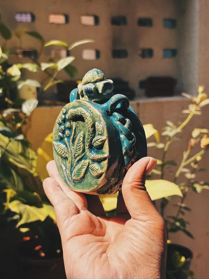 This student came in as a beginner, but her pieces look anything but. Her curious nature made her try things without overthinking, resulting in this bold and dramatic dragon jar and other wonderfully experimental pieces.