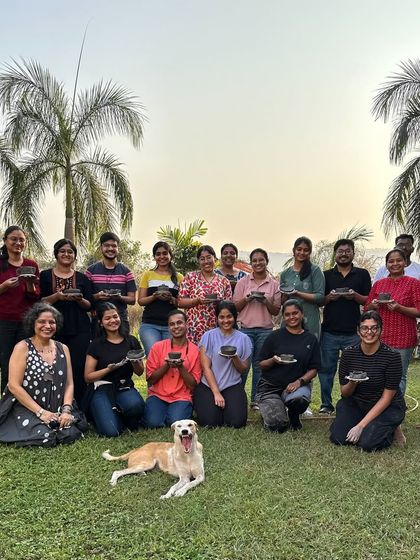 The wonderful group of research scholars from the Tata Memorial Centre, proudly holding the pieces they created during our outdoor pottery session. A day of science meeting soil.