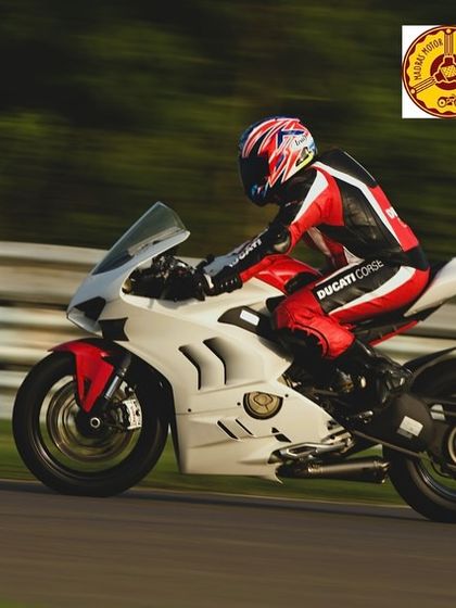 A white Ducati Panigale V4 showing its pace. The variety of bikes at our track days means you get to see and ride alongside some incredible machines.