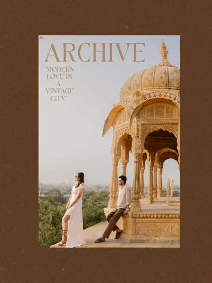 Modern love in a vintage city. This shot of Prince and Khushi in Jaisalmer plays with composition, placing them against the stunning architecture of Bada Bagh to create a stylish, editorial-style portrait.