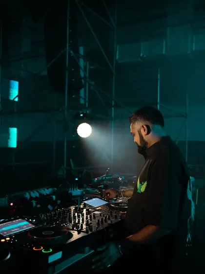 In the zone at the DGTL Modular Stage. The moody, atmospheric lighting of the warehouse setting is perfect for deep, melodic techno journeys.