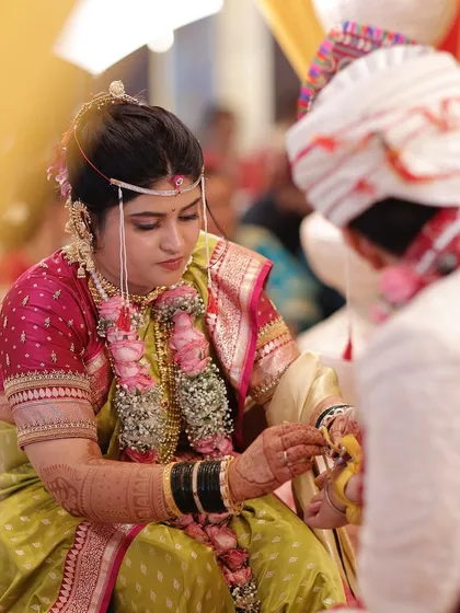The beauty of tradition. The makeup is designed to complement the rich colours of the nauvari saree and the intricate gold jewellery.