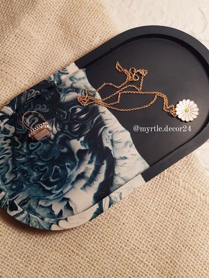 A top-down view of our ocean-themed tray, showing the beautiful contrast between the solid navy and the marble pattern.