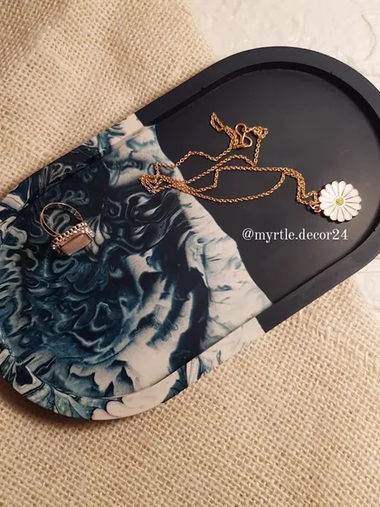 A top-down view of our ocean-themed tray, showing the beautiful contrast between the solid navy and the marble pattern.