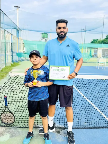Here is one of our youngest champions, Aabaan Sachdeva, after winning the Under-10 singles title at just 8.5 years old. Our beginner's program focuses on building strong fundamentals and a love for the game, setting the stage for future success on the court.
