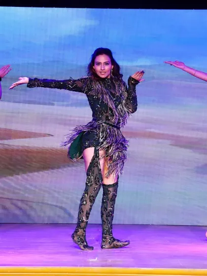 Leading my team on stage. Our instructor-led performances give students a chance to dance alongside their mentors in a professional setting.