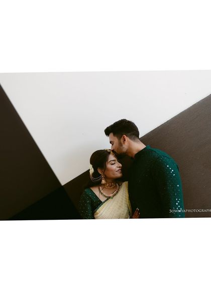 A modern and artistic engagement portrait. We used the strong architectural lines and simple color palette to create a clean, contemporary feel for this intimate moment.