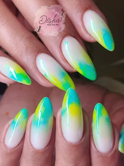 A beautiful watercolor effect with shades of yellow, green, and blue on a milky white base.