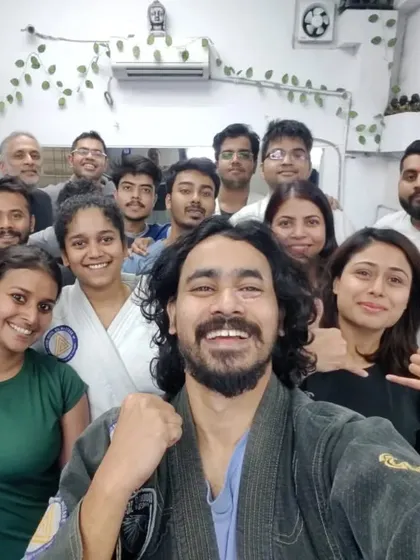 A big, happy group selfie showing the full range of our diverse BJJ Familia.