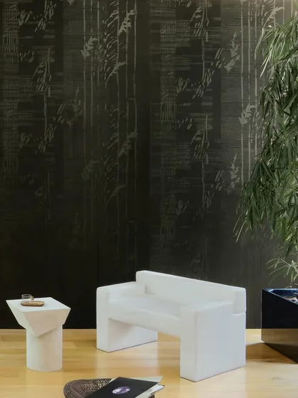 Soft velvet unfolds like a hidden landscape. This wallcovering features delicate impressions that whisper the quiet harmony of a Japanese garden, creating a serene and deeply luxurious atmosphere.