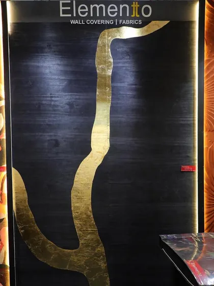 Our booth at the Ajio Luxe Weekend, showcasing a stunning black and gold wallcovering. We bring together iconic brands to help you elevate your interiors with the finest craftsmanship and timeless style.