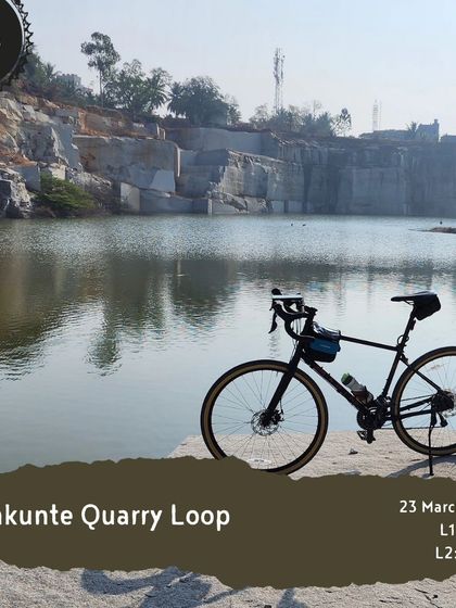 A bike is parked at the edge of the stunning Rajankunte Quarry, a unique and picturesque spot on one of our beginner-friendly loops.