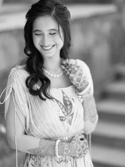A beautiful black and white candid of the bride's natural, happy smile. It's these simple, genuine expressions that make the most beautiful portraits.