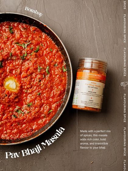 A top-down view of a perfectly cooked pan of bhaji next to the masala that made it happen. My blend adds a rich colour, bold aroma, and an irresistible flavour that defines a true Bombay Pav Bhaji.