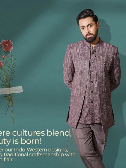 Where cultures blend, beauty is born. This mauve Indo-Western outfit, with its layered jacket and matching trousers, infuses traditional craftsmanship with a modern flair.