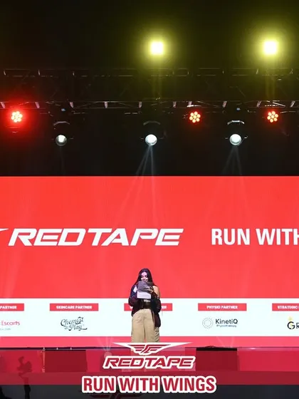 Your brand, front and center. This is the main stage at the RedTape 10K, where the brand's identity is the undeniable focal point. I ensure every visual element, from the largest screen to the smallest detail, reinforces your message with power and clarity.