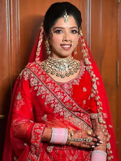 A full portrait showing the heavy kundan jewellery set that I provided to complete her look.