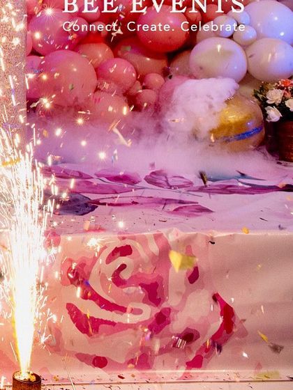 The magic of celebration! A close-up of a party setup with a cold pyro sparkler and dry ice smoke, adding a dramatic and exciting effect to the event.