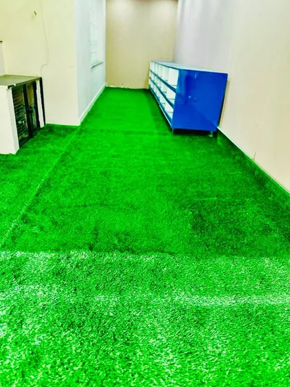 A closer look at the texture of our turf used in an indoor setting. It provides a soft and visually interesting flooring alternative for commercial or residential rooms.
