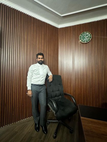 A moment in my office. I believe that success in the legal field is not found by waiting, but by being deeply engaged in the work of representing and defending my clients.